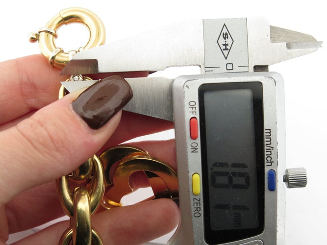 Bracelet bracelet gourmette breloques coeur zodiac t18 or jaune 18k 90.5gr charms 58 Facettes 270131