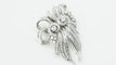 Broche Art déco double clips en or blanc et platine, diamants