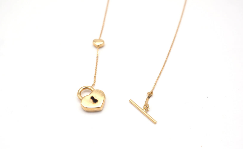 Collier Chaîne et pendentif cadena et coeur en or jaune 58 Facettes