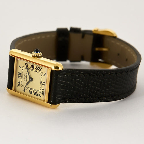 Montre CARTIER - Montre Tank Must en argent plaqué or, cadran blanc chiffres romains 58 Facettes