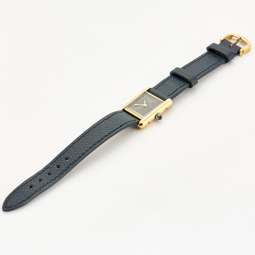 Montre CARTIER - Montre Modèle Tank Must en argent plaqué or, cadran laqué noir 58 Facettes