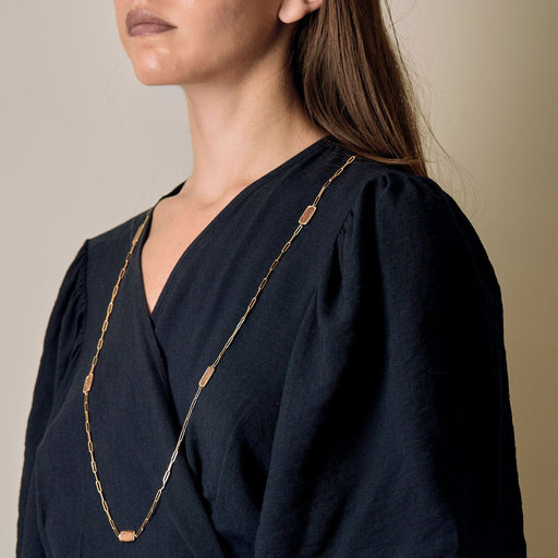 Collier DINH VAN - Rare sautoir de la collection Impression en or jaune et bois d'Amourette 58 Facettes LOR3480