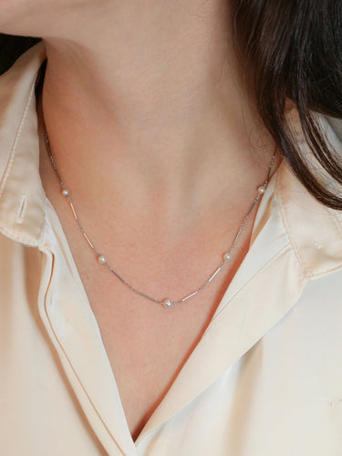 Collier Collier chaîne vintage or blanc perles 58 Facettes 941