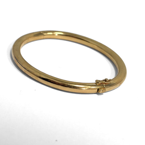 Bracelet jonc ouvrant grand modèle en or jaune 18k