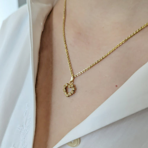 Pendentif Pendentif coeur en or jaune et diamants 58 Facettes 33147