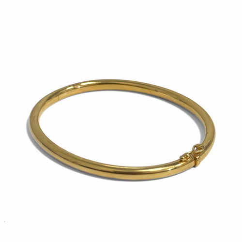 Bracelet jonc ouvrant moyen modèle en or jaune 18k