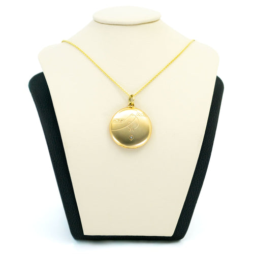 Médaillon en or jaune avec perle ronde