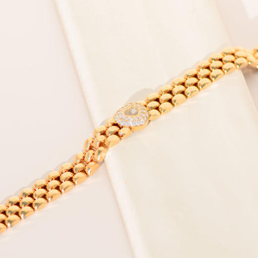 Boucles d'oreilles Chopard - Armband Happy Diamonds Herz-Motiv en or jaune et diamants 58 Facettes 3294