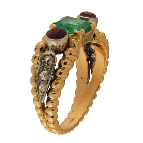 Bague Bague vintage en or jaune et blanc sertie d'une émeraude de 0,72 carat, de rubis et de diamants. 58 Facettes G3880