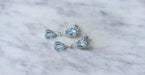 Boucles d'oreilles Boucles d'oreilles Gouttes or blanc, topaze bleue, diamant 58 Facettes