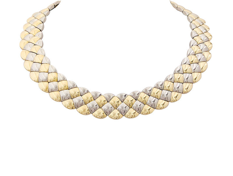 Collier Aldebert or jaune et blanc.