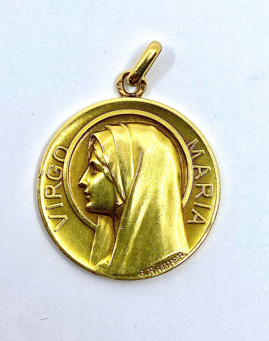 Médaille en or jaune représentant la Vierge Marie, signée G. Rabier