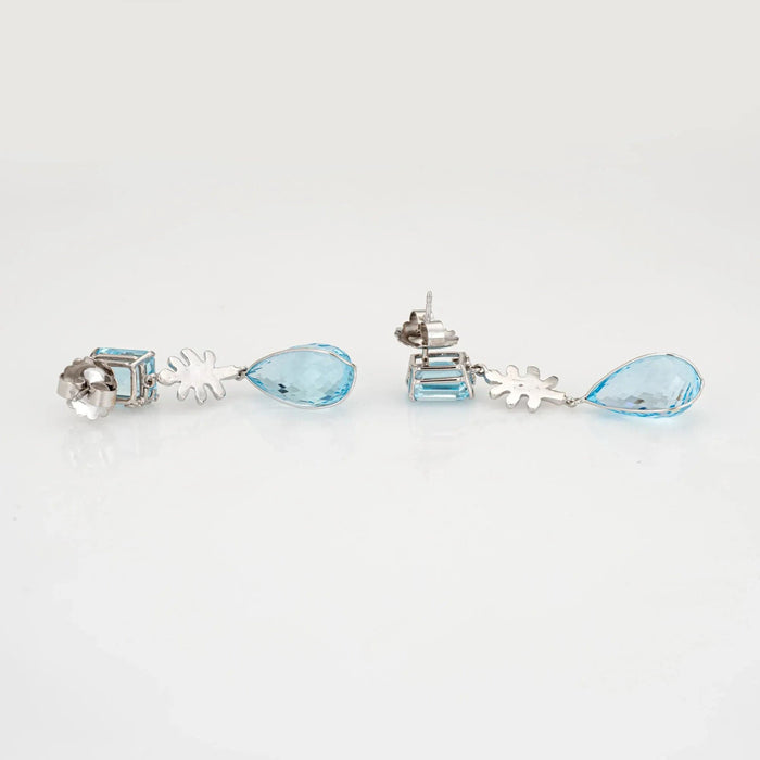 Boucles d'oreilles Boucles d'oreilles pendantes en or blanc avec topaze bleue et diamant 58 Facettes G13548