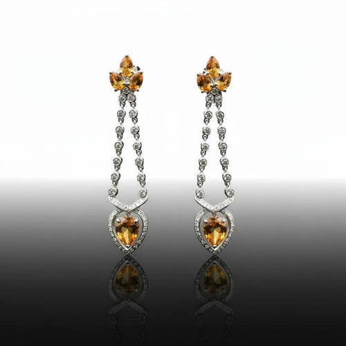 Boucles d'oreilles Ensemble collier et boucles d'oreilles sertis de topazes et de diamants 58 Facettes