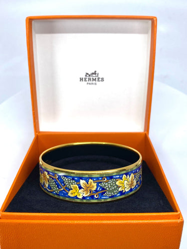 Bracelet HERMÈS - bracelet en métal doré et émail 58 Facettes AB657