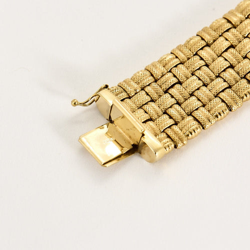 Bracelet Large bracelet tressé en or jaune 58 Facettes LOR3435