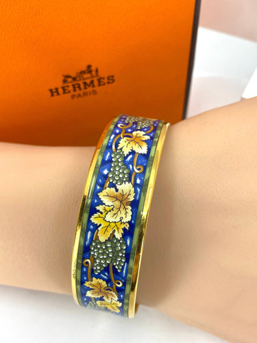 Bracelet HERMÈS - bracelet en métal doré et émail 58 Facettes AB657