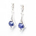 Earrings Tanzanite Earrings in White Gold and Diamonds 58 Facettes D361154SP