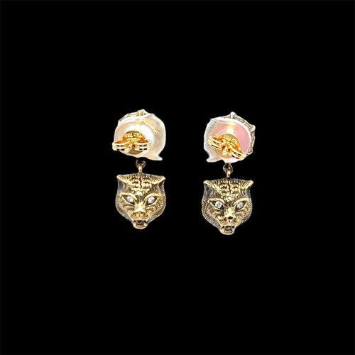Boucles d'oreilles Gucci - Boucles d'oreilles tête de chat en or et pierres précieuses Le Marche des Marseilles 58 Facettes