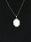 Pendentif Pendentif Art Deco or blanc nacre diamants perles fines 58 Facettes J227