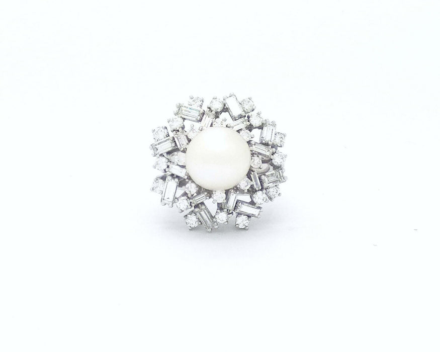 Bague Bague avec perle et diamants 58 Facettes