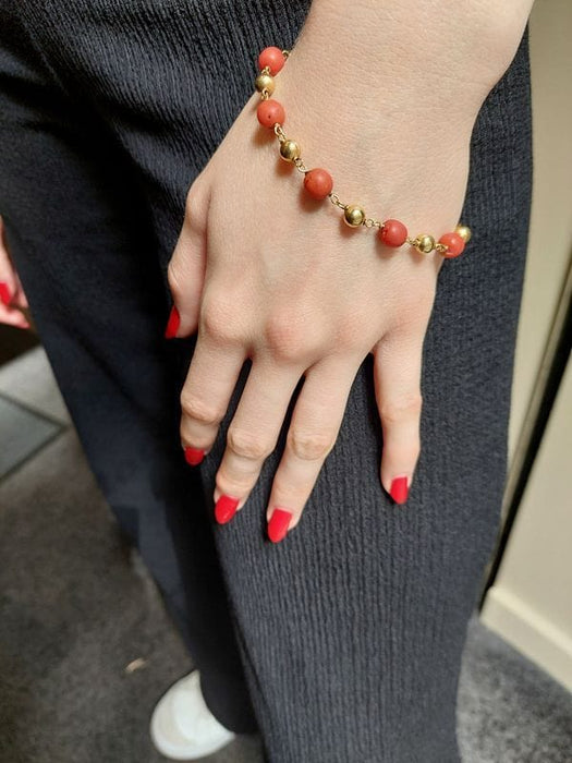 Bracelet BRACELET BOULES CORAIL OR JAUNE 58 Facettes 086761