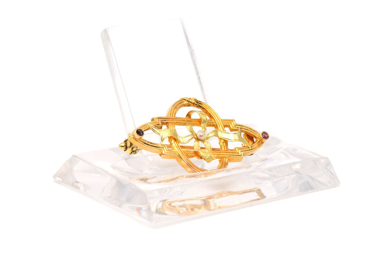 Broche Broche Art Nouveau en or jaune sertie d'une perle et de rubis 58 Facettes 22963