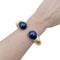 Bracelet Bracelet jonc Ilias Lalaounis, collection "Neolithic", en or jaune martelé et sodalite. 58 Facettes 34906