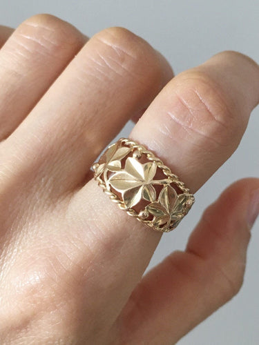 Bague en or jaune motif végétal