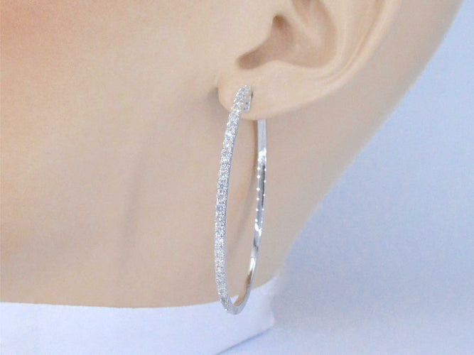 Boucles d'oreilles Boucles d'oreilles créoles en or blanc avec diamants 58 Facettes 2053