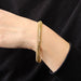 Bracelet Bracelet gourmette américaine fin or jaune 58 Facettes CVBR66