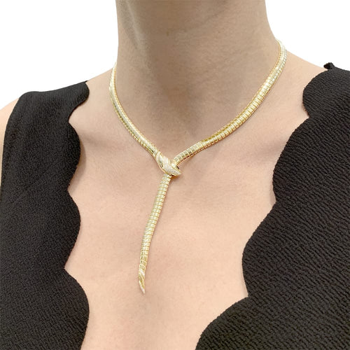 Collier Collier Bulgari, « Serpenti Tubogas », or jaune, diamants, onyx. 58 Facettes 35159