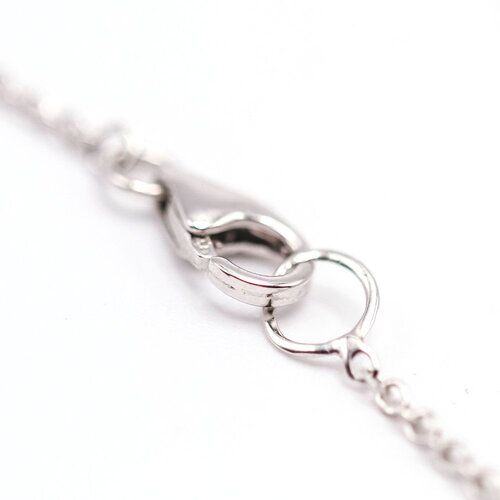 Collier BELL en or blanc et topaze bleue