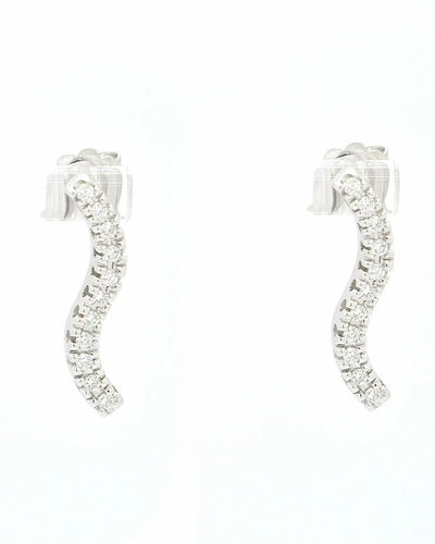 Boucles d'oreilles Boucles d'oreilles tennis en or blanc effet vague 58 Facettes 9619