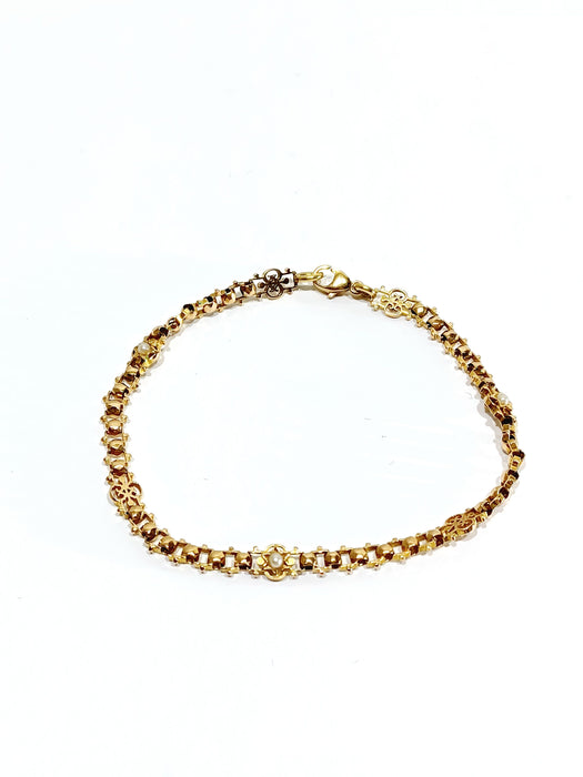 Bracelet en or rose et perles