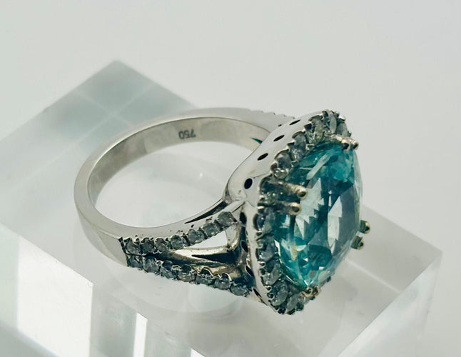 Bague 54 Bague en or blanc avec halo central d'aigue-marine et de diamants 58 Facettes 50298