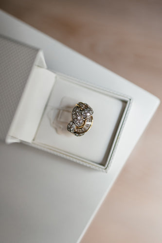 Bague Bague vintage en or jaune et blanc avec diamants. 58 Facettes