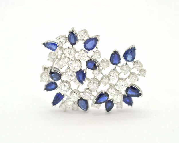 Broche Broche en or blanc sertie de diamants et de saphirs naturels 58 Facettes 8226