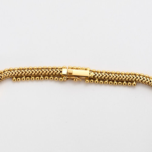 Collier Collier de passementerie or jaune 58 Facettes VAN0114