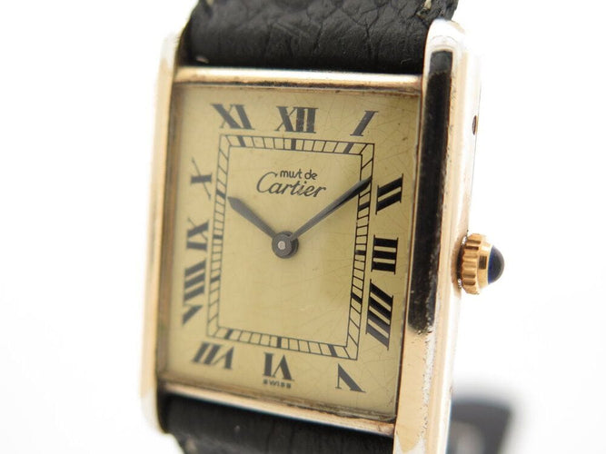 Montre vintage montre must de CARTIER tank 30 mm mecanique vermeil dore en 58 Facettes 266183