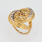 Bague 50 Bague vintage en or jaune et diamants avec nœud infini des années 70 58 Facettes G13169