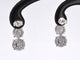 Boucles d'oreilles Boucles d'oreilles en or blanc avec trois chatons de diamants les uns en dessous des autres 58 Facettes 2110