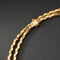 Collier Collier en or jaune 18K à deux rangs, signé MELLERIO. 58 Facettes