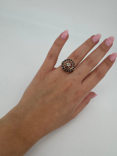 Bague 52 Bague - Or jaune rubis, saphirs et diamants 58 Facettes 1073