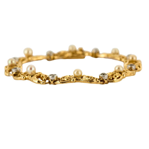 Bracelet Bracelet or jaune et gris, perles et diamants 58 Facettes ENG10572