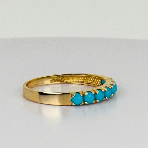 Bague Bague en or jaune avec turquoises 58 Facettes 2507016