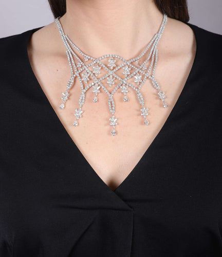 Collier Collier plastron articulé en or gris et diamants 58 Facettes 259085