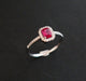 Ring 54 Ring set with a Ruby, Diamond surround 58 Facettes