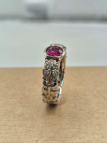 Bague solitaire rubis en or blanc 18kt et diamants