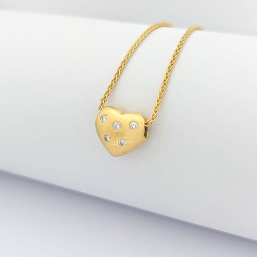 Collier cœur en or jaune et diamants